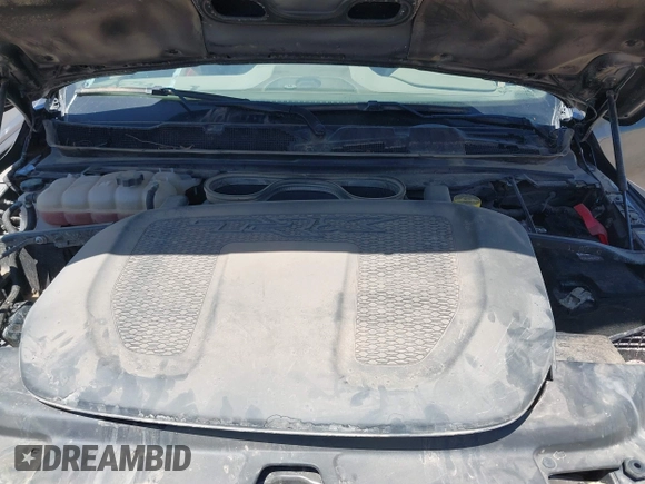 2022 Ram 1500 TRX with VIN 1C6SRFU97NN353587, listed as a IAAI auction lot 42174702 with 35,305 mi miles and . Bid and sale history available at DreamBid. Image 10.