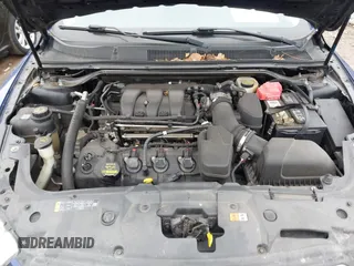 2014 Ford Taurus SEL with VIN 1FAHP2E80EG106719, listed as a IAAI auction lot 41967594 with 194,426 mi miles and . Bid and sale history available at DreamBid. Image 10.