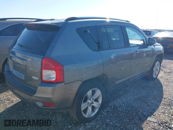 2012 Jeep Compass Latitude with VIN 1C4NJDEBXCD563543, listed as a IAAI auction lot 41711187 with 149,100 mi miles. Bid and sale history available at carsss.com. Image 4.