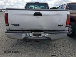 2001 Ford Super Duty F-250 XL with VIN 1FTNX20F61EB23095, listed as a Copart auction lot 74060304 with 458,656 mi miles and Salvage Title. Bid and sale history available at carsss.com. Image 6.
