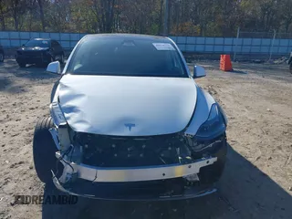 2023 Tesla Model Y Long Range with VIN 7SAYGAEE1PF828338, listed as a IAAI auction lot 40978725 with Not Provided miles and . Bid and sale history available at DreamBid. Image 13.
