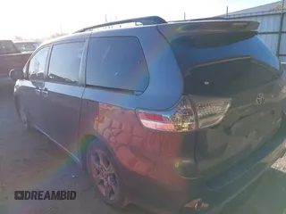 2014 Toyota Sienna SE with VIN 5TDXK3DC1ES462473, listed as a IAAI auction lot 41811437 with 209,704 mi miles and . Bid and sale history available at DreamBid. Image 3.