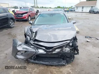 2023 Toyota Camry SE z VIN 4T1T11AK8PU802097, wystawiony jako IAAI lot #42389754 z przebiegiem 19 732 mil mil oraz . Historia ofert i sprzedaży dostępna na DreamBid. Obrazek 12.