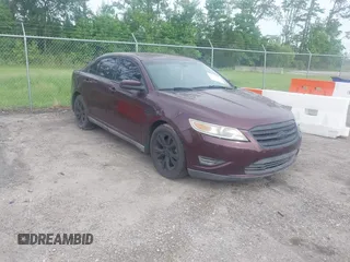 2011 Ford Taurus SEL z VIN 1FAHP2EW2BG158959, wystawiony jako IAAI lot #42479927 z przebiegiem 156 790 mil mil oraz . Historia ofert i sprzedaży dostępna na DreamBid. Obrazek 1.