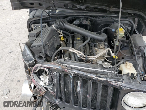 2000 Jeep Wrangler Sport with VIN 1J4FA49S9YP743515, listed as a Copart auction lot 53906305 with 247,349 mi miles and Salvage title. Bid and sale history available at DreamBid. Image 12.