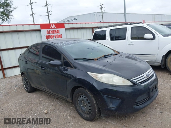 2012 Ford Fiesta SE z VIN 3FADP4BJ8CM173590, wystawiony jako IAAI lot #40732721 z przebiegiem 156 874 mil mil oraz . Historia ofert i sprzedaży dostępna na DreamBid. Obrazek 1.