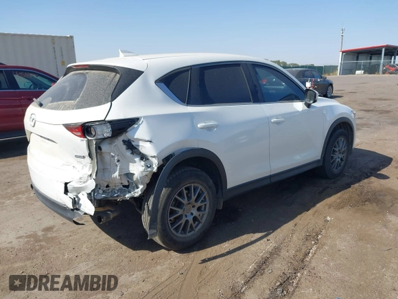 2017 Mazda CX-5 Sport with VIN JM3KFABL5H0124725, listed as a IAAI auction lot 40487298 with 103,889 mi miles. Bid and sale history available at carsss.com. Image 4.