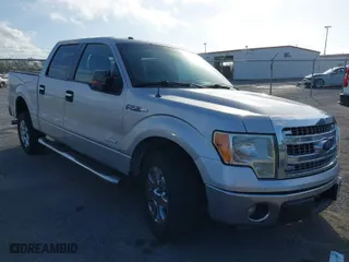 2013 Ford F-150 XL with VIN 1FTFW1CT9DKD02756, listed as a IAAI auction lot 40759592 with 218,975 mi miles. Bid and sale history available at carsss.com. Image 1.