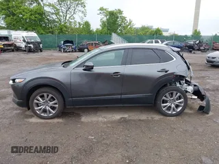 2023 Mazda CX-30 S Preferred z VIN 3MVDMBCM5PM576771, wystawiony jako IAAI lot #42244842 z przebiegiem 14 814 mil mil oraz . Historia ofert i sprzedaży dostępna na DreamBid. Obrazek 14.