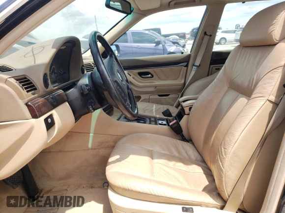 1997 BMW 7 Series 740il with VIN WBAGJ8324VDM02317, listed as a Copart auction lot 64879564 with 107,365 mi miles and Salvage Title. Bid and sale history available at carsss.com. Image 7.