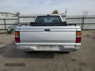 1988 Mitsubishi Mighty Max z VIN JA7FL24D2JP013297, wystawiony jako Copart lot #79533724 z przebiegiem 117 397 mil mil oraz Tytuł czysty. Historia ofert i sprzedaży dostępna na DreamBid. Obrazek 6.