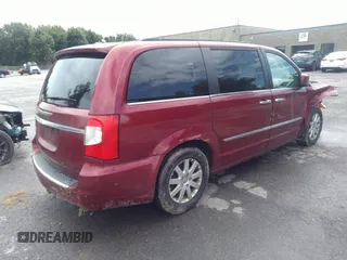 2016 Chrysler Town & Country Touring with VIN 2C4RC1BG6GR150001, listed as a IAAI auction lot 40123738 with 149,006 mi miles. Bid and sale history available at carsss.com. Image 4.