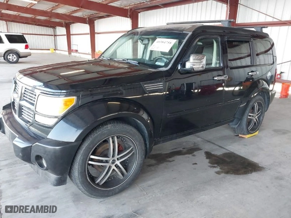 2007 Dodge Nitro R/T with VIN 1D8GU58637W630452, listed as a IAAI auction lot 40384758 with 160,498 mi miles. Bid and sale history available at carsss.com. Image 2.