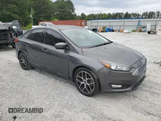2018 Ford Focus SE z VIN 1FADP3FE1JL220741, wystawiony jako Copart lot #53755735 z przebiegiem Nie podano mil oraz Czysty tytuł • Clean title. Historia ofert i sprzedaży dostępna na DreamBid. Obrazek 4.