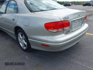 2002 Mazda Millenia with VIN JM1TA221721722364, listed as a IAAI auction lot 42160683 with 166,778 mi miles and . Bid and sale history available at DreamBid. Image 14.