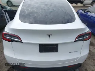 2023 Tesla Model Y Long Range with VIN 7SAYGDEE2PA145398, listed as a IAAI auction lot 41546573 with 20,812 mi miles and . Bid and sale history available at carsss.com. Image 15.