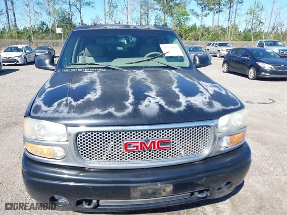 2005 GMC Yukon XL Denali with VIN 1GKFK66U65J201988, listed as a IAAI auction lot 41798992 with NaN miles. Bid and sale history available at carsss.com. Image 6.