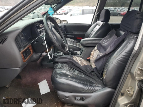 1996 Jeep Grand Cherokee Laredo with VIN 1J4GZ58Y5TC378100, listed as a Copart auction lot 85493724 with 0 mi miles and Salvage Title. Bid and sale history available at carsss.com. Image 7.
