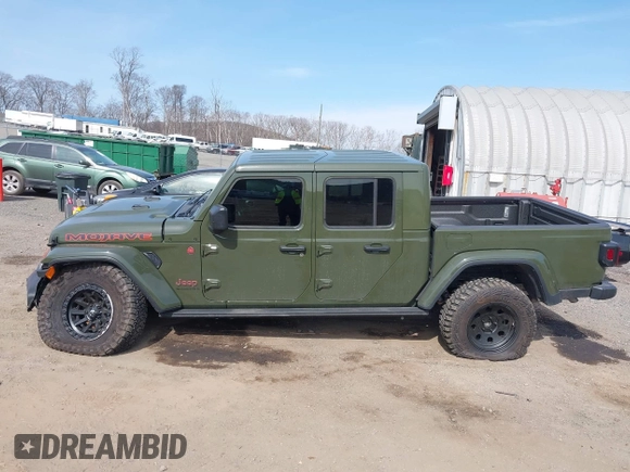 2023 Jeep Gladiator Mojave with VIN 1C6JJTEG6PL564504, listed as a IAAI auction lot 41752685 with 20,430 mi miles and . Bid and sale history available at DreamBid. Image 14.