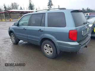 2005 Honda Pilot EX with VIN 2HKYF18465H565524, listed as a IAAI auction lot 41927812 with 218,637 mi miles. Bid and sale history available at carsss.com. Image 3.