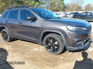 2020 Jeep Cherokee Latitude Plus with VIN 1C4PJLLB0LD648493, listed as a IAAI auction lot 41224900 with 70,995 mi miles. Bid and sale history available at carsss.com. Image 1.
