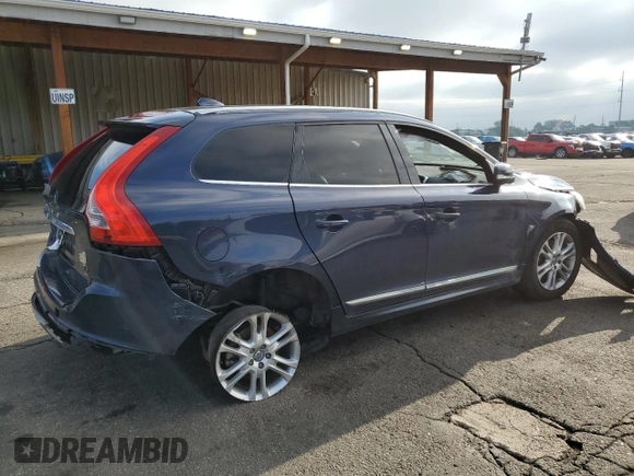 2015 Volvo XC60 T5 with VIN YV4612RK3F2716604, listed as a Copart auction lot 59855665 with 100,989 mi miles and Salvage title. Bid and sale history available at DreamBid. Image 3.