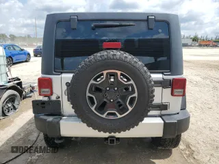 2012 Jeep Wrangler Unlimited Sport z VIN 1C4BJWDG8CL220960, wystawiony jako Copart lot #57823315 z przebiegiem 177 541 mil mil oraz Szkoda całkowita • Salvage title. Historia ofert i sprzedaży dostępna na DreamBid. Obrazek 6.