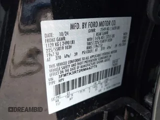 2024 Ford Mustang Mach-E Premium z VIN 3FMTK3R72RMA42779, wystawiony jako IAAI lot #42099121 z przebiegiem 1 791 mil mil oraz . Historia ofert i sprzedaży dostępna na DreamBid. Obrazek 9.