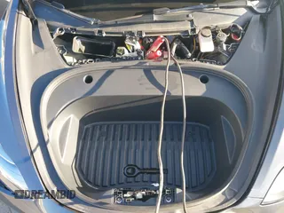 2022 Tesla Model 3 Long Range with VIN 5YJ3E1EB4NF293635, listed as a IAAI auction lot 41388234 with 28,396 mi miles and . Bid and sale history available at DreamBid. Image 10.