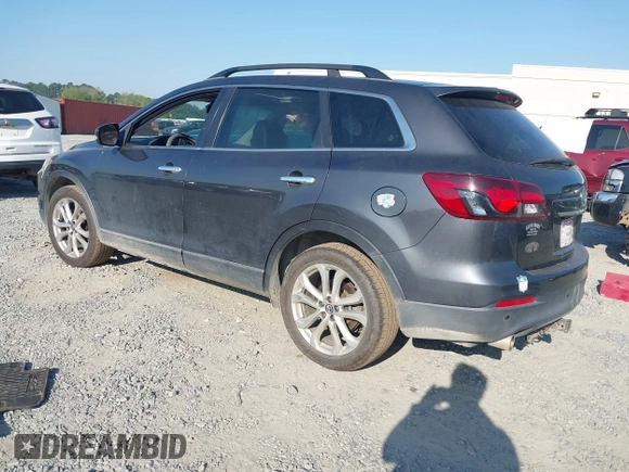 2013 Mazda CX-9 Grand Touring z VIN JM3TB2DA6D0424124, wystawiony jako IAAI lot #42032588 z przebiegiem 151 569 mil mil oraz . Historia ofert i sprzedaży dostępna na DreamBid. Obrazek 3.