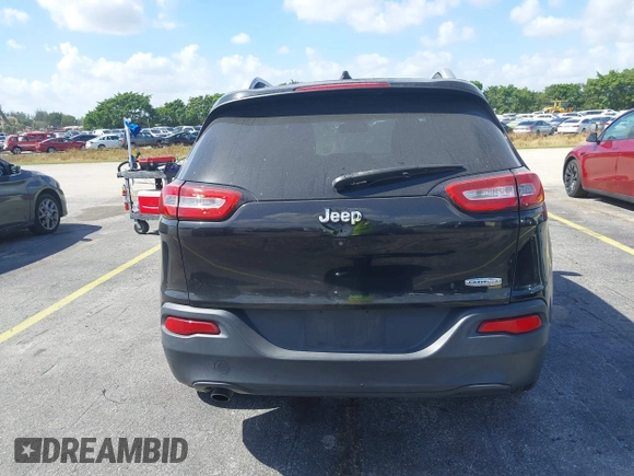 2015 Jeep Cherokee Latitude with VIN 1C4PJLCB4FW683904, listed as a IAAI auction lot 41579059 with 126,156 mi miles and . Bid and sale history available at carsss.com. Image 16.