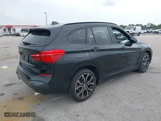 2021 BMW X1 sDrive28i with VIN WBXJG7C05M5U03116, listed as a IAAI auction lot 39837867 with 16,788 mi miles. Bid and sale history available at carsss.com. Image 4.