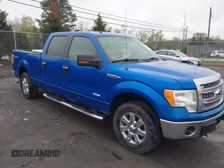 2013 Ford F-150 XL with VIN 1FTFW1ET1DFB28476, listed as a IAAI auction lot 42009048 with 148,213 mi miles and . Bid and sale history available at DreamBid. Image 1.