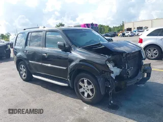 2011 Honda Pilot Touring z VIN 5FNYF3H98BB003853, wystawiony jako IAAI lot #39507053 z przebiegiem 206 717 mil mil oraz . Historia ofert i sprzedaży dostępna na DreamBid. Obrazek 1.