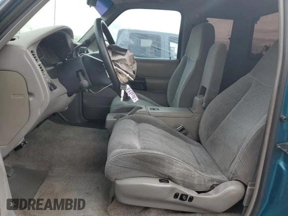 1997 Ford Ranger XLT with VIN 1FTCR15X0VPB28557, listed as a Copart auction lot 81848864 with 137,598 mi miles and Salvage Title. Bid and sale history available at DreamBid. Image 7.