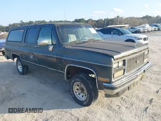 1989 GMC Suburban z VIN 1GKEV16KXKF536870, wystawiony jako IAAI lot #41531645 z przebiegiem 13 976 mil mil oraz . Historia ofert i sprzedaży dostępna na DreamBid. Obrazek 1.