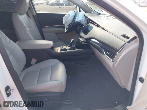 2023 Cadillac XT4 FWD Luxury with VIN 1GYAZAR41PF170763, listed as a IAAI auction lot 42585594 with 48,130 mi miles and . Bid and sale history available at DreamBid. Image 5.