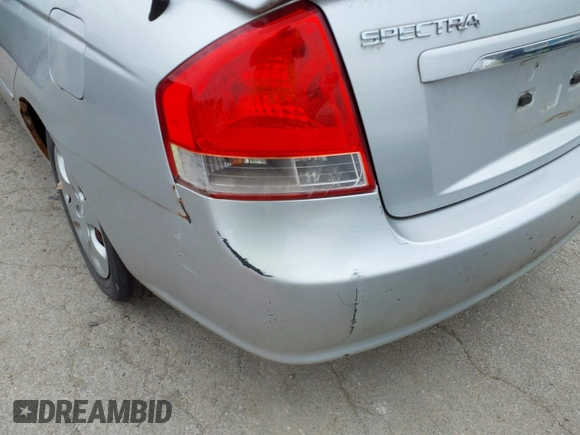 2009 Kia Spectra EX with VIN KNAFE221995613874, listed as a IAAI auction lot 42467453 with 104,158 mi miles and . Bid and sale history available at DreamBid. Image 6.