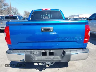 2016 Toyota Tundra SR z VIN 5TFRM5F13GX095535, wystawiony jako IAAI lot #41618316 z przebiegiem 131 386 mil mil oraz . Historia ofert i sprzedaży dostępna na DreamBid. Obrazek 17.