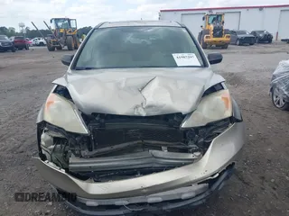 2007 Honda CR-V EX with VIN JHLRE38567C054005, listed as a IAAI auction lot 41987297 with 206,145 mi miles and . Bid and sale history available at carsss.com. Image 12.