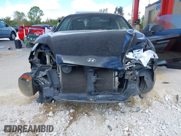 2006 Hyundai Tiburon GT z VIN KMHHN65F56U224768, wystawiony jako IAAI lot #40672721 z przebiegiem 158 535 mil mil oraz . Historia ofert i sprzedaży dostępna na DreamBid. Obrazek 6.