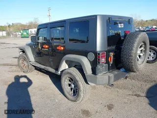 2010 Jeep Wrangler Unlimited Sport with VIN 1J4BA3H17AL219679, listed as a IAAI auction lot 42010714 with 194,172 mi miles. Bid and sale history available at carsss.com. Image 3.