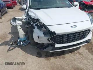 2020 Ford Escape SE with VIN 1FMCU0G60LUC45045, listed as a IAAI auction lot 42014651 with 96,202 mi miles and . Bid and sale history available at DreamBid. Image 6.