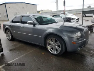 2006 Chrysler 300 C with VIN 2C3KA63H26H218136, listed as a Copart auction lot 49209315 with 215,682 mi miles and Salvage Title. Bid and sale history available at carsss.com. Image 4.