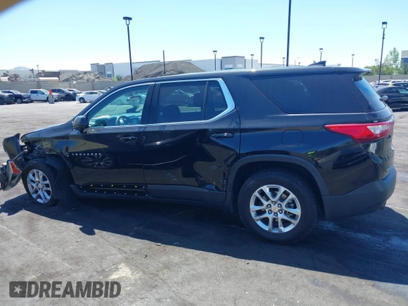 2019 Chevrolet Traverse LS z VIN 1GNERFKW3KJ222388, wystawiony jako IAAI lot #42225444 z przebiegiem 94 777 mil mil oraz . Historia ofert i sprzedaży dostępna na DreamBid. Obrazek 14.