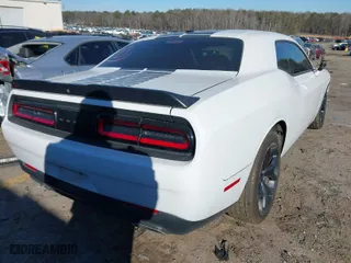 2020 Dodge Challenger SXT with VIN 2C3CDZAG3LH243534, listed as a IAAI auction lot 41422893 with 107,017 mi miles. Bid and sale history available at carsss.com. Image 4.