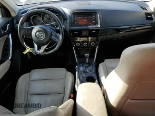 2014 Mazda CX-5 Grand Touring with VIN JM3KE4DY3E0327895, listed as a Copart auction lot 51073305 with 233,938 mi miles and Non Repairable. Bid and sale history available at carsss.com. Image 8.