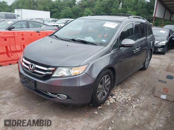 2016 Honda Odyssey Touring Elite with VIN 5FNRL5H96GB063176, listed as a IAAI auction lot 42157604 with 106,177 mi miles. Bid and sale history available at carsss.com. Image 20.