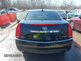 2009 Cadillac CTS AWD z VIN 1G6DH577290166448, wystawiony jako IAAI lot #41751610 z przebiegiem 158 378 mil mil oraz . Historia ofert i sprzedaży dostępna na DreamBid. Obrazek 16.