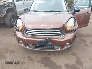 2014 MINI Countryman with VIN WMWZB3C51EWR36737, listed as a IAAI auction lot 41741248 with 69,717 mi miles and . Bid and sale history available at DreamBid. Image 6.